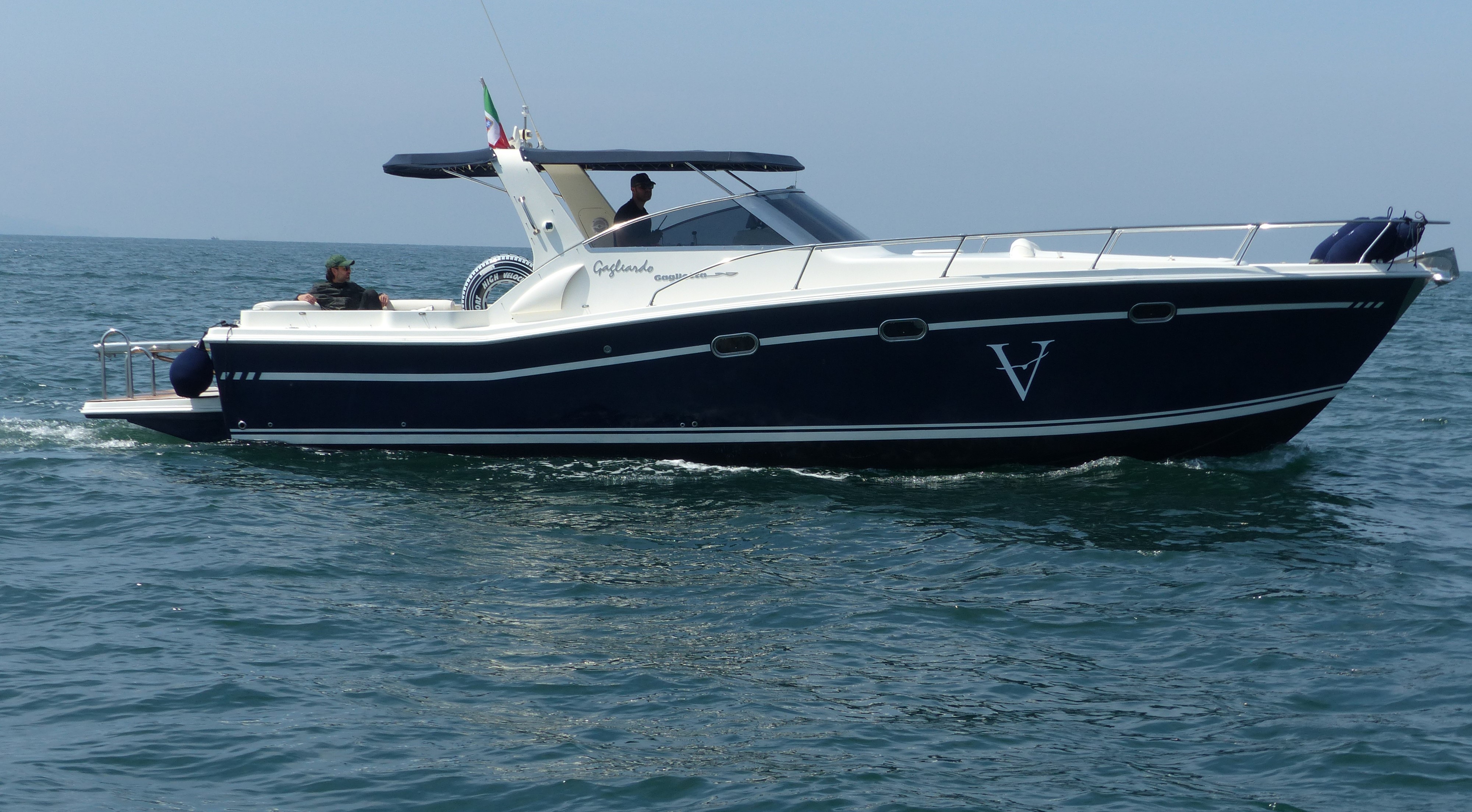 Private motor yacht cruising along the Amalfi Coast