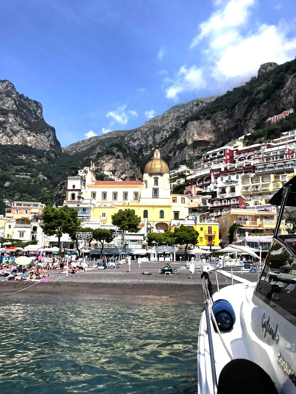 The private boat arriving in front of Positano along the Amalfi Coast